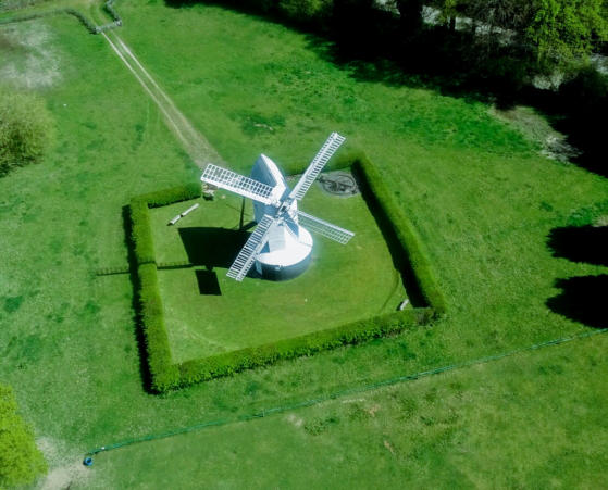the mill from high in the sky on a sunny day